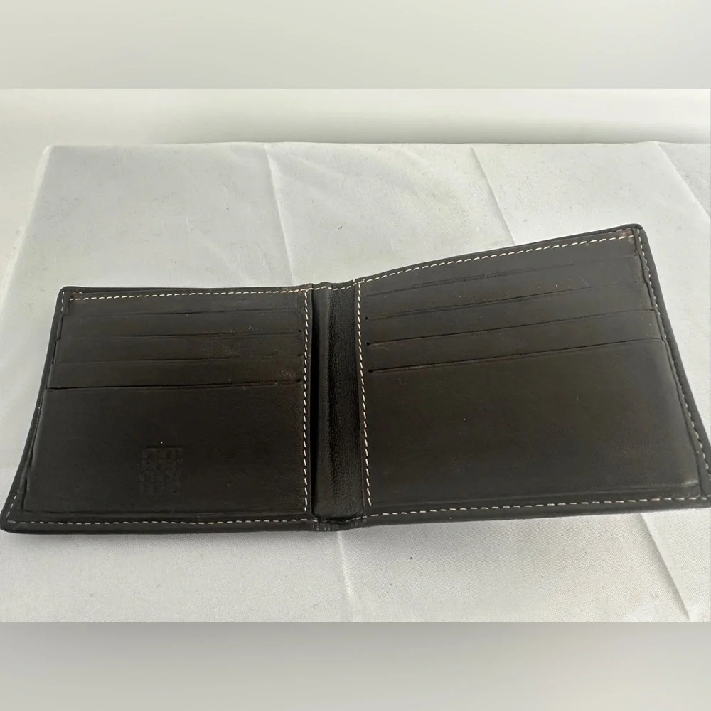Carolina Herrera bifold canvas and brown leather bi fold wallet